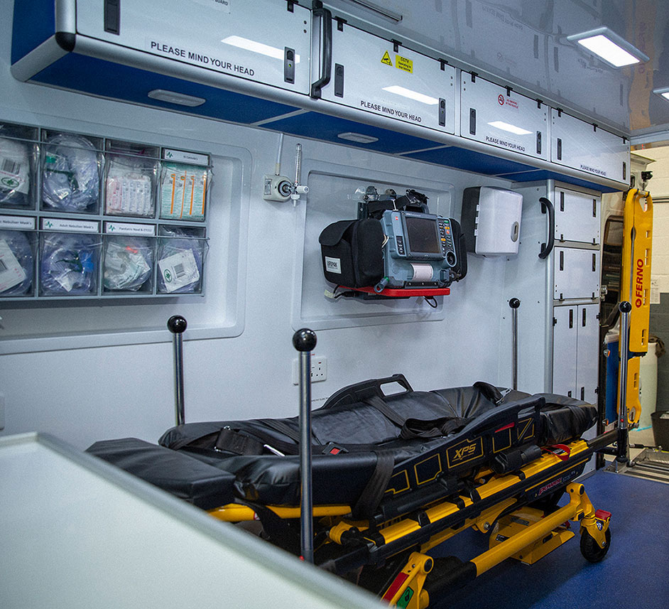 inside of ambulance showing stretcher and medical equipment